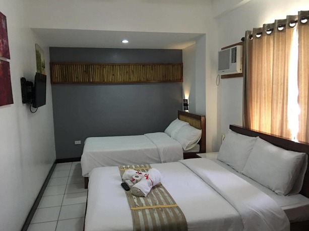 Imagen de la habitación del Hotel Ark Bayz Suites. Foto 7