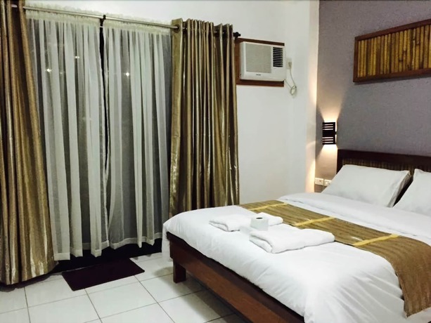 Imagen de la habitación del Hotel Ark Bayz Suites. Foto 8