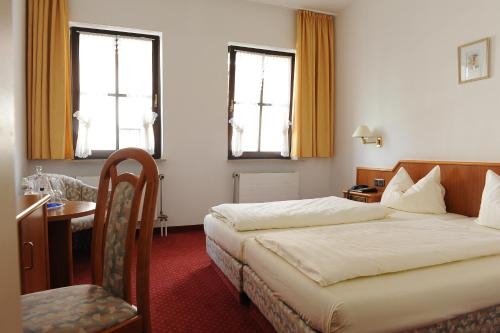 Imagen de la habitación del Hotel Arkaden. Foto 8