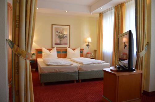 Imagen de la habitación del Hotel Arkaden. Foto 9