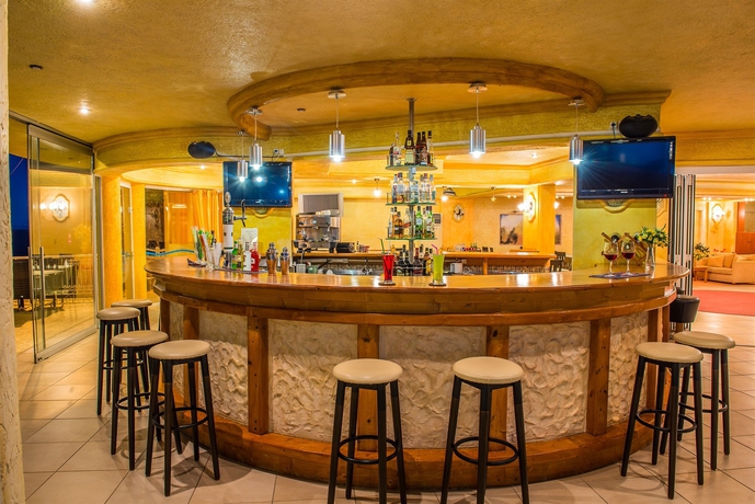 Imagen del bar/restaurante del Hotel Arkadia Luxury Apartments. Foto 2