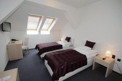Imagen de la habitación del Hotel Arkadia, Pecs. Foto 7