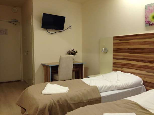 Imagen de la habitación del Hotel Arkadia and Hostel. Foto 10