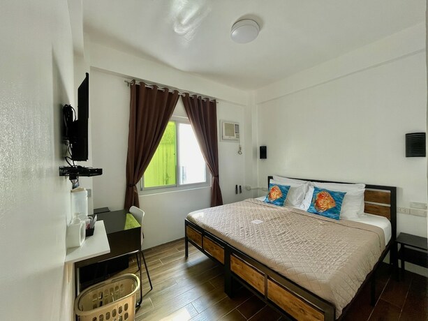 Imagen de la habitación del Hotel Arkipelago Beach Resort. Foto 14
