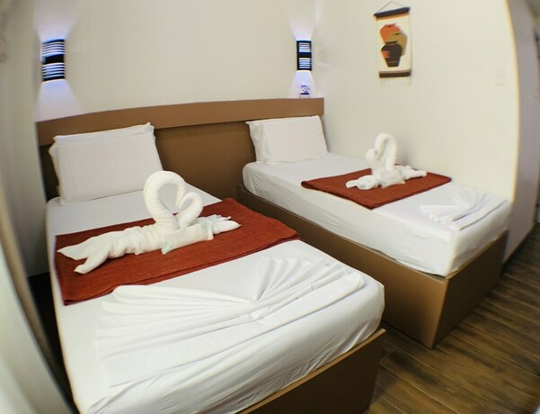 Imagen de la habitación del Hotel Arkipelago Beach Resort. Foto 21
