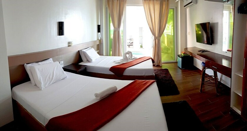 Imagen de la habitación del Hotel Arkipelago Beach Resort. Foto 27