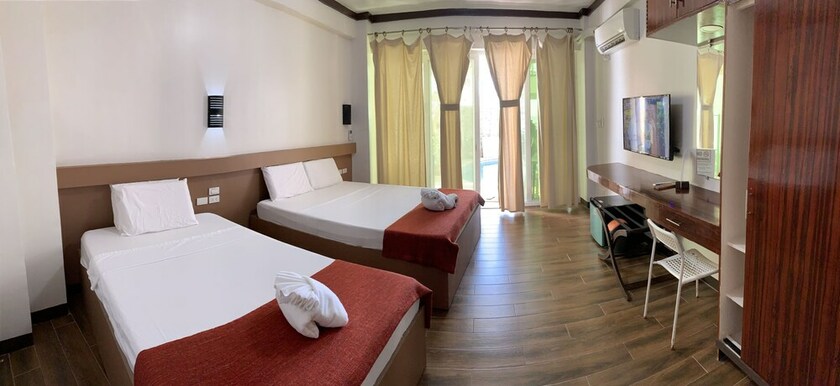 Imagen de la habitación del Hotel Arkipelago Beach Resort. Foto 29