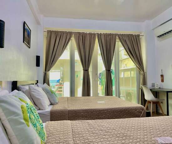 Imagen de la habitación del Hotel Arkipelago Beach Resort. Foto 32