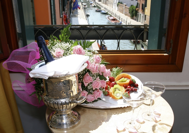 Imagen de la habitación del Hotel Arlecchino, Venecia. Foto 7