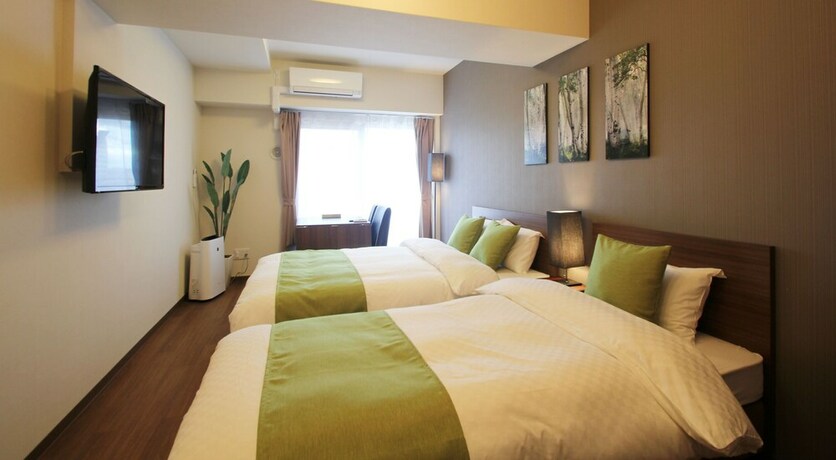 Imagen de la habitación del Hotel Arlis House Shin Osaka North. Foto 18