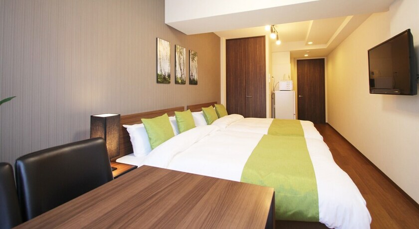 Imagen de la habitación del Hotel Arlis House Shin Osaka North. Foto 21