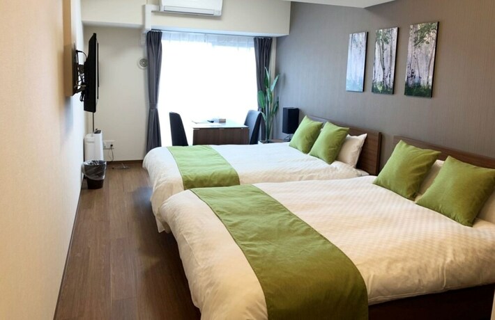 Imagen de la habitación del Hotel Arlis House Shin Osaka North. Foto 23