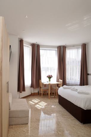 Imagen de la habitación del Hotel Arlo Apartments. Foto 5