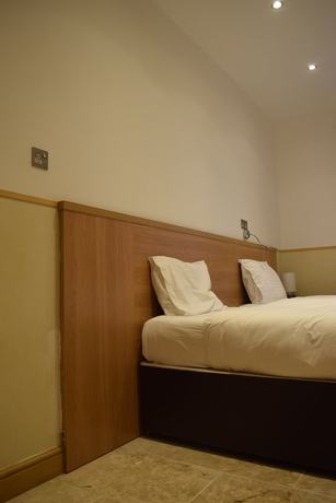 Imagen de la habitación del Hotel Arlo Apartments. Foto 11