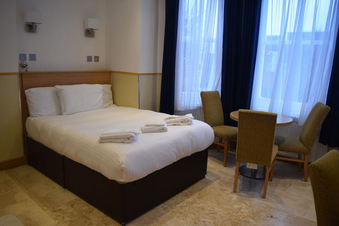 Imagen de la habitación del Hotel Arlo Apartments. Foto 15