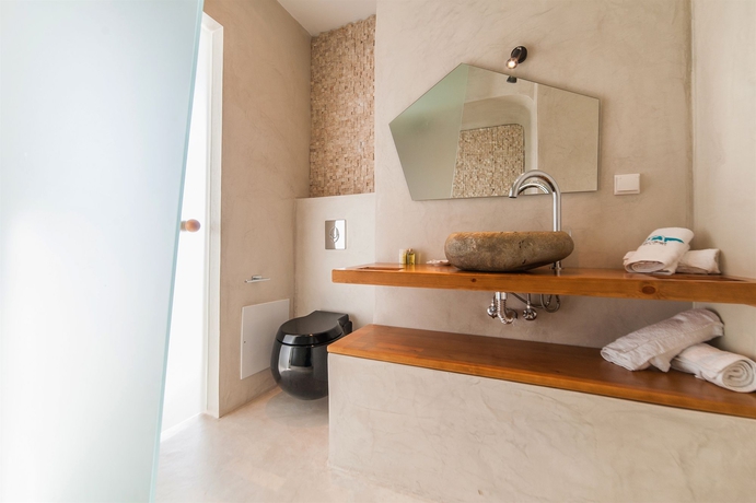 Imagen de la habitación del Hotel Armeni Village Rooms and Suites. Foto 11