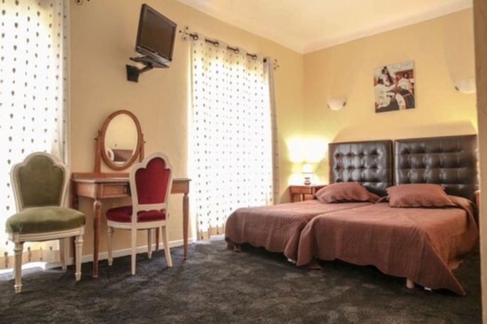 Imagen de la habitación del Hotel Armenonville. Foto 11