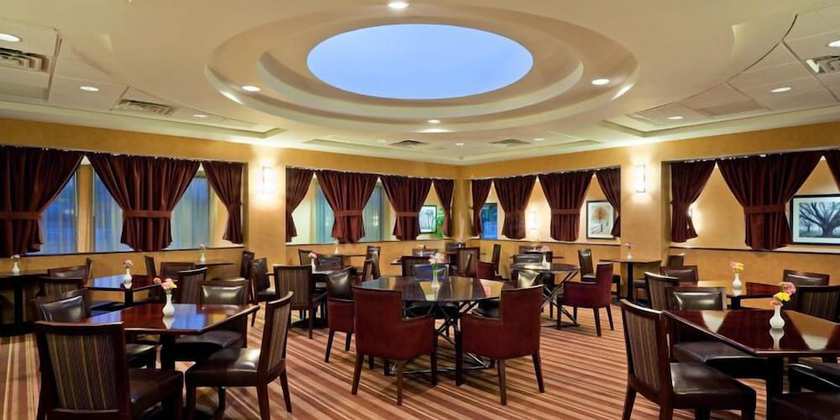 Imagen del bar/restaurante del Hotel Armoni Inn And Suites. Foto 4