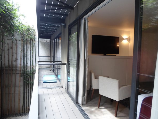 Imagen de la habitación del Hotel Armonik Suites. Foto 12