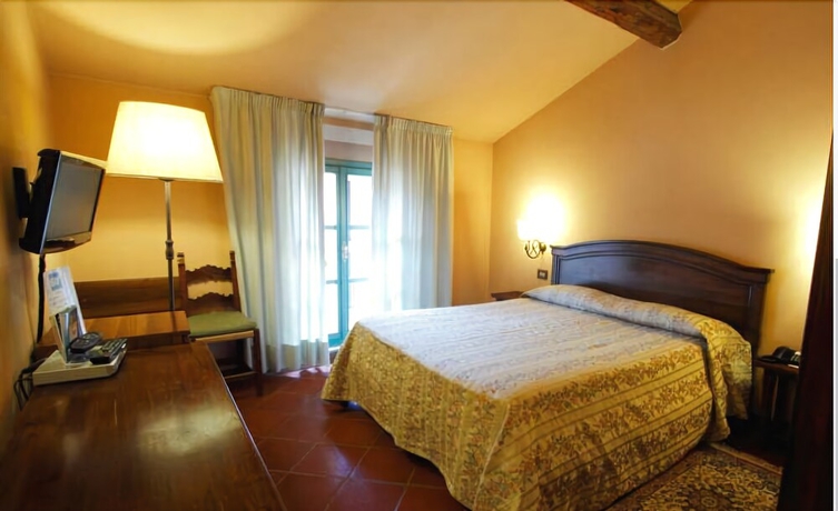 Imagen de la habitación del Hotel Arnaldo Aquila D'oro. Foto 12