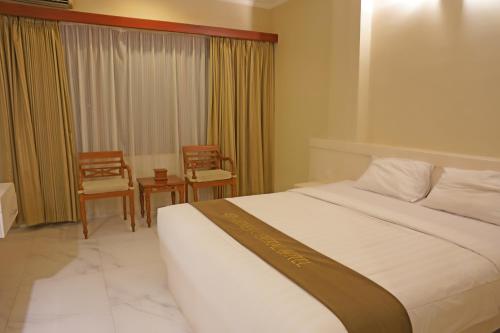 Imagen de la habitación del Hotel Arnes Central. Foto 7