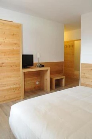 Imagen de la habitación del Hotel Arnica. Foto 9
