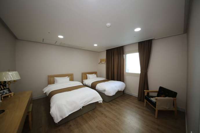 Imagen de la habitación del Hotel Aroha. Foto 8
