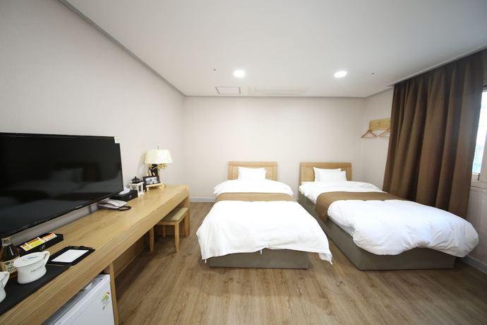 Imagen de la habitación del Hotel Aroha. Foto 13