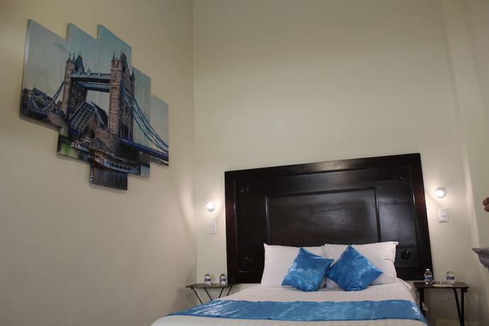 Imagen de la habitación del Hotel Aroma 406. Foto 17