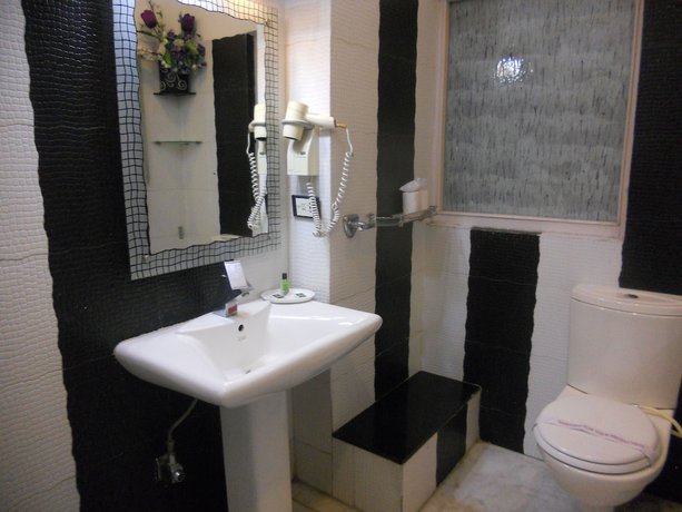 Imagen de la habitación del Hotel Aroma, Chandigarh. Foto 8