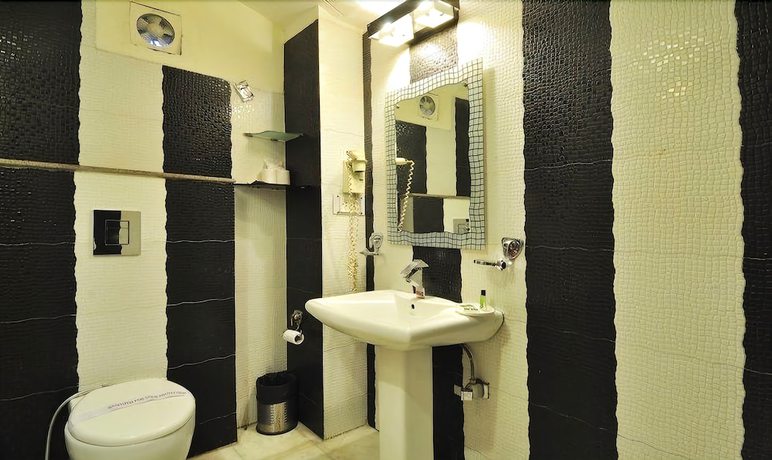 Imagen de la habitación del Hotel Aroma, Chandigarh. Foto 11