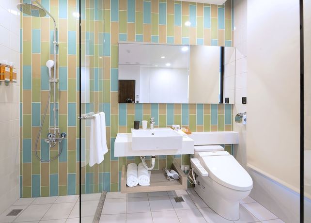 Imagen de la habitación del Hotel Aroma Chew. Foto 10