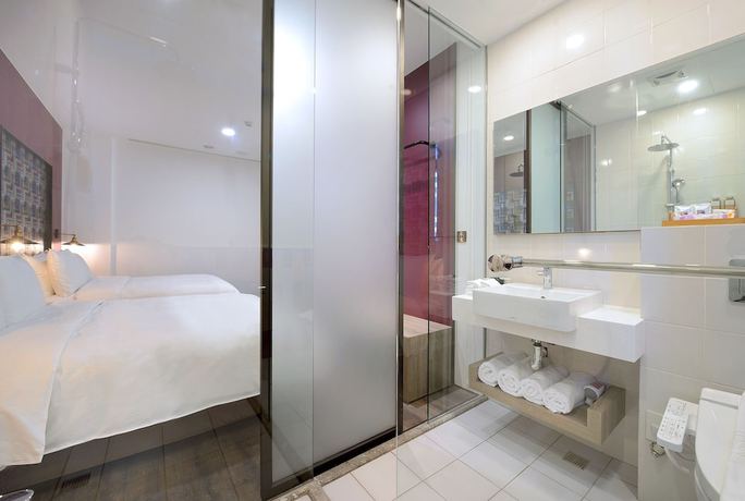 Imagen de la habitación del Hotel Aroma Chew. Foto 11