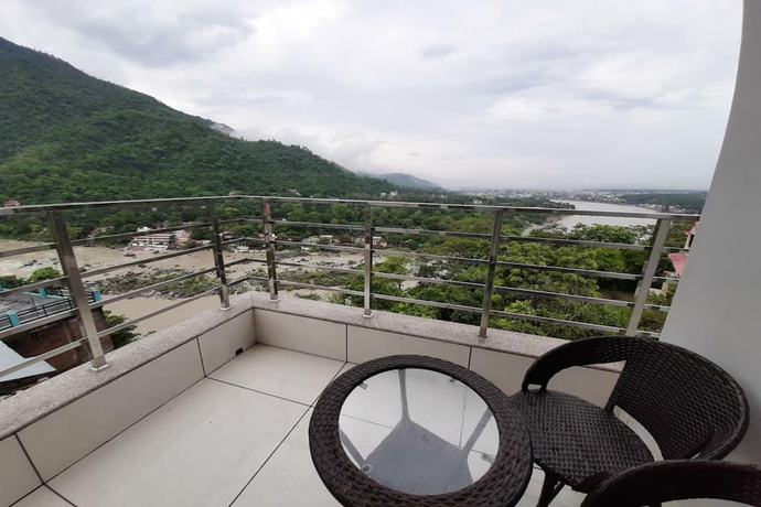 Imagen de la habitación del Hotel Aroma Ganga View. Foto 6