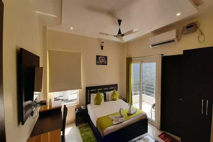 Imagen de la habitación del Hotel Aroma Ganga View. Foto 8
