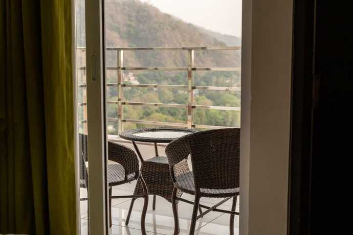 Imagen de la habitación del Hotel Aroma Ganga View. Foto 9