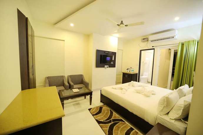 Imagen de la habitación del Hotel Aroma Ganga View. Foto 14