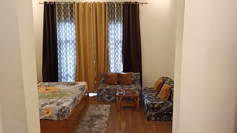 Imagen de la habitación del Hotel Aroma Green Resort. Foto 4