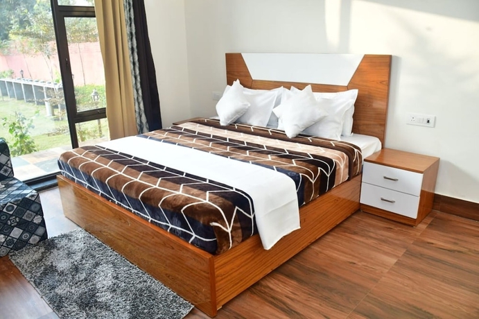 Imagen de la habitación del Hotel Aroma Green Resort. Foto 9