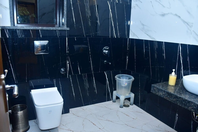 Imagen de la habitación del Hotel Aroma Green Resort. Foto 14