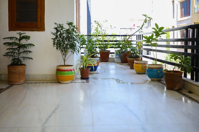 Imagen de la habitación del Hotel Aroma Home Stay. Foto 16