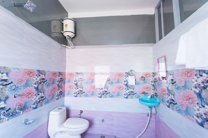 Imagen de la habitación del Hotel Aroma Home Stay. Foto 18