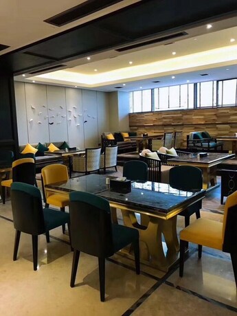 Imagen del bar/restaurante del Hotel Aroma Hotel. Foto 3