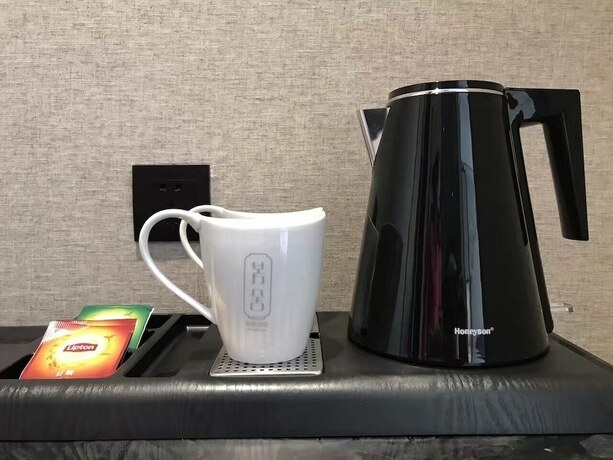 Imagen de la habitación del Hotel Aroma Hotel. Foto 14