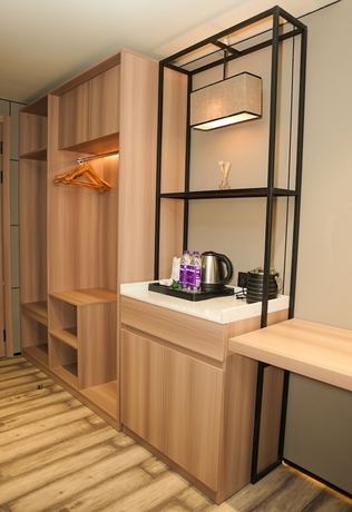 Imagen de la habitación del Hotel Aroma Inn. Foto 5