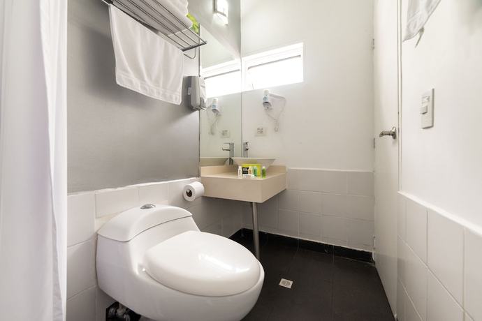 Imagen de la habitación del Hotel Aromax del Campestre. Foto 14