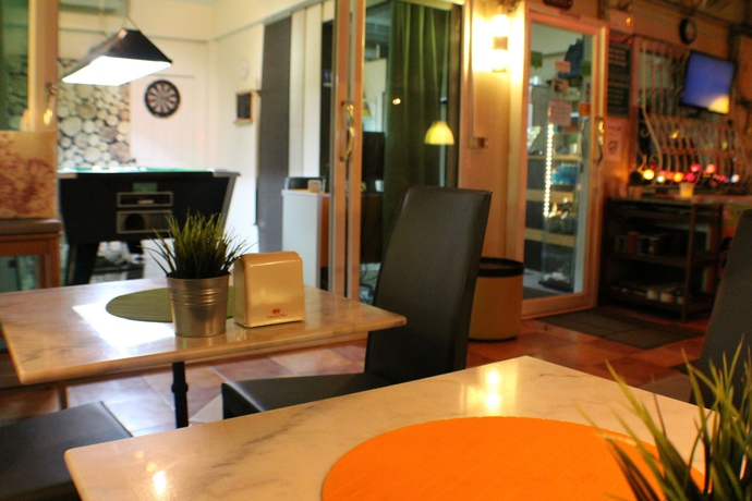 Imagen del bar/restaurante del Hotel Aromdee Apartment. Foto 5