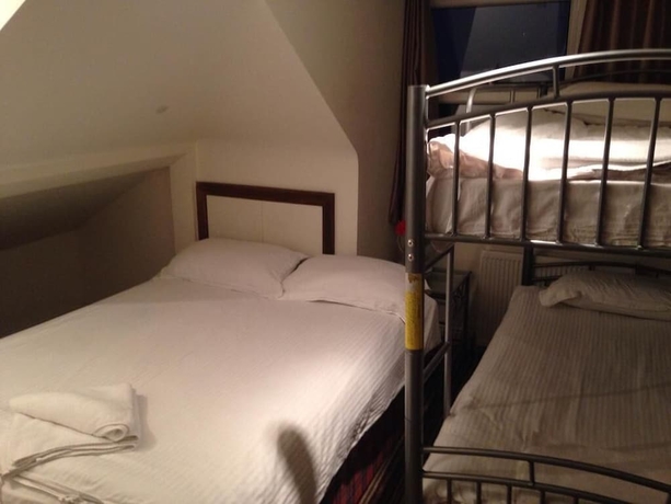 Imagen de la habitación del Hotel Aron Guest House. Foto 2