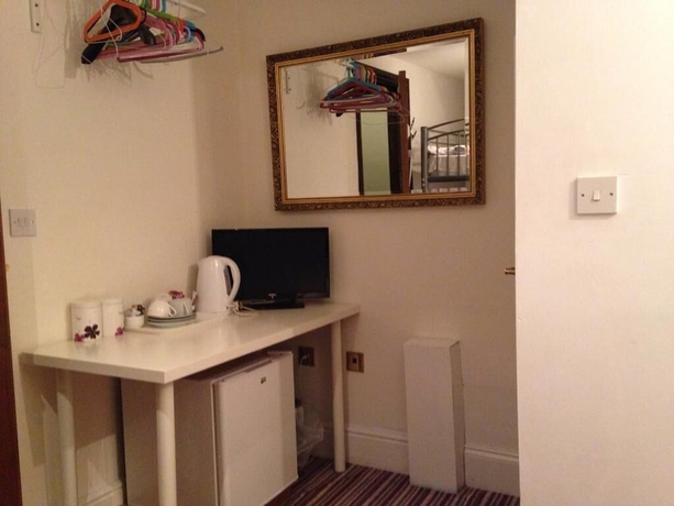 Imagen de la habitación del Hotel Aron Guest House. Foto 3