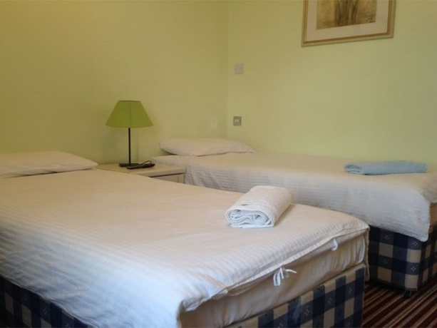 Imagen de la habitación del Hotel Aron Guest House. Foto 5